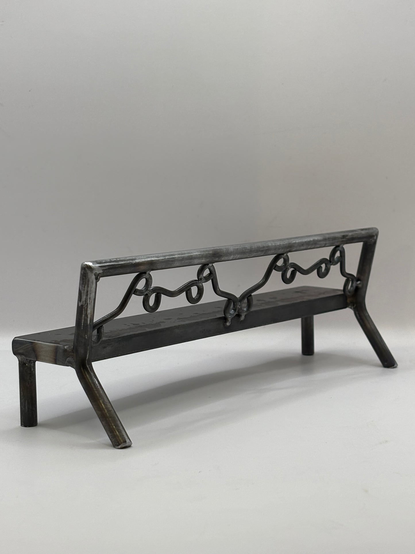 Scrolled pattern bench 1 of 1