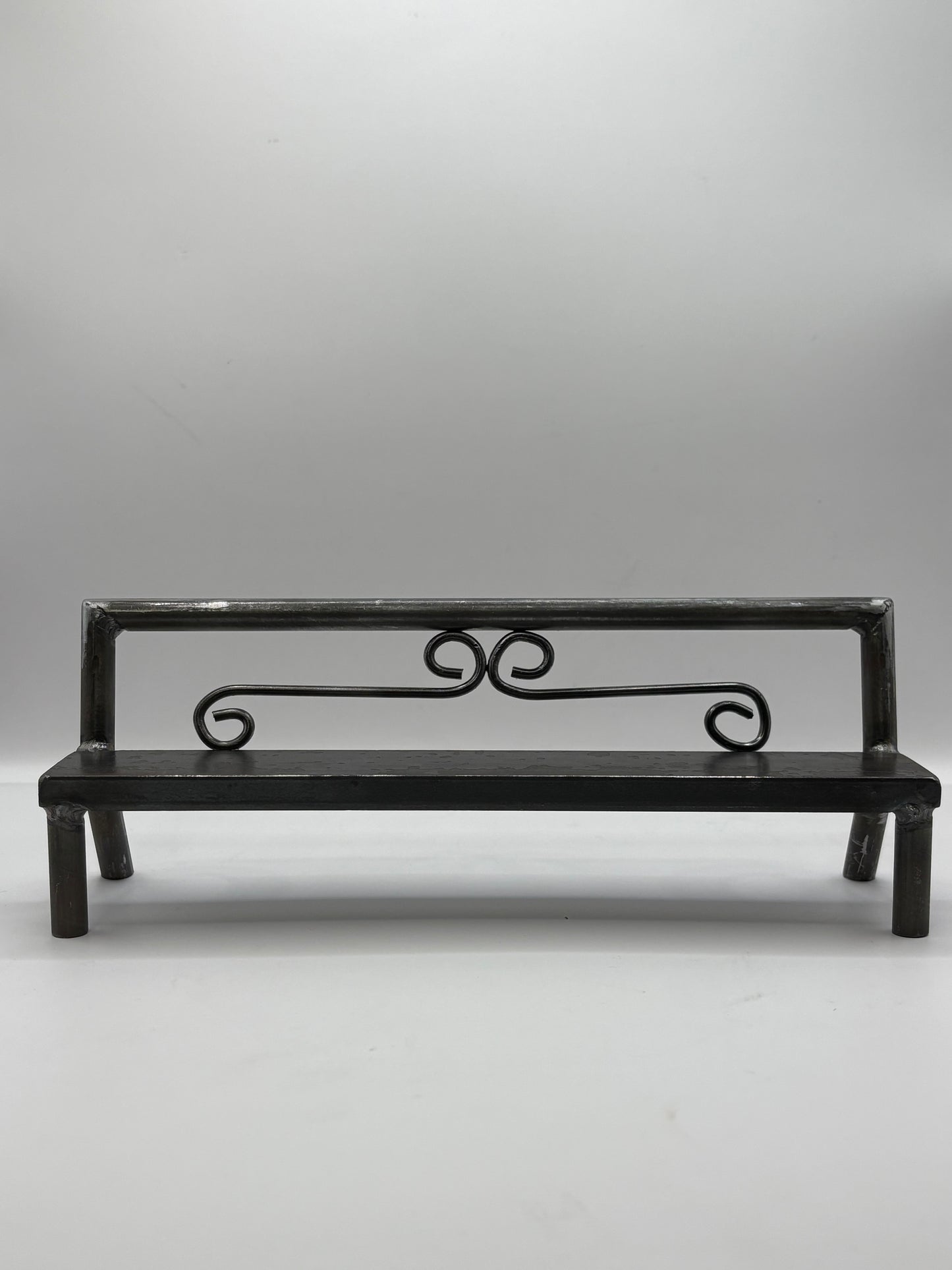 Unique scroll bench 1 of 1