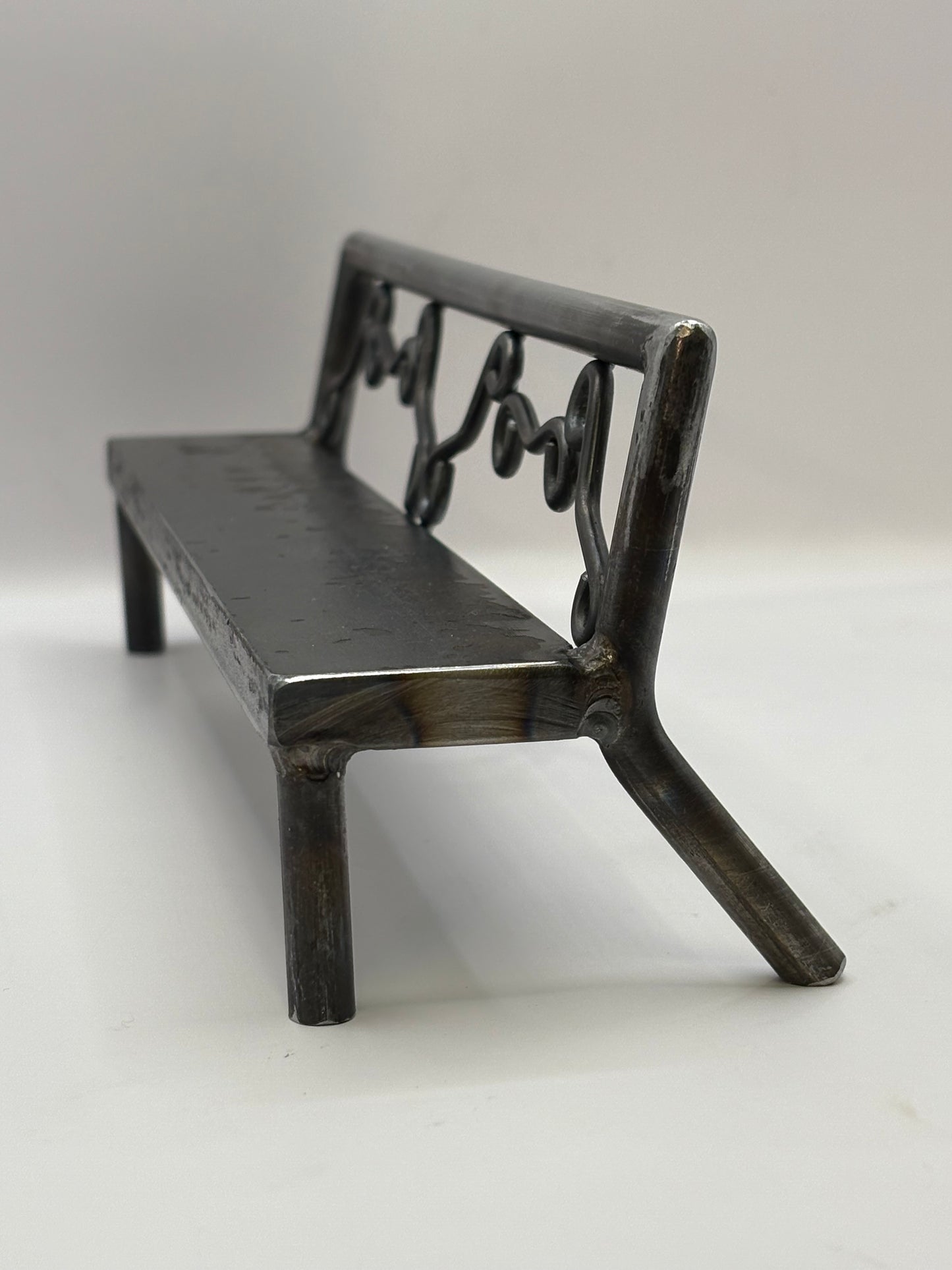 Scrolled pattern bench 1 of 1