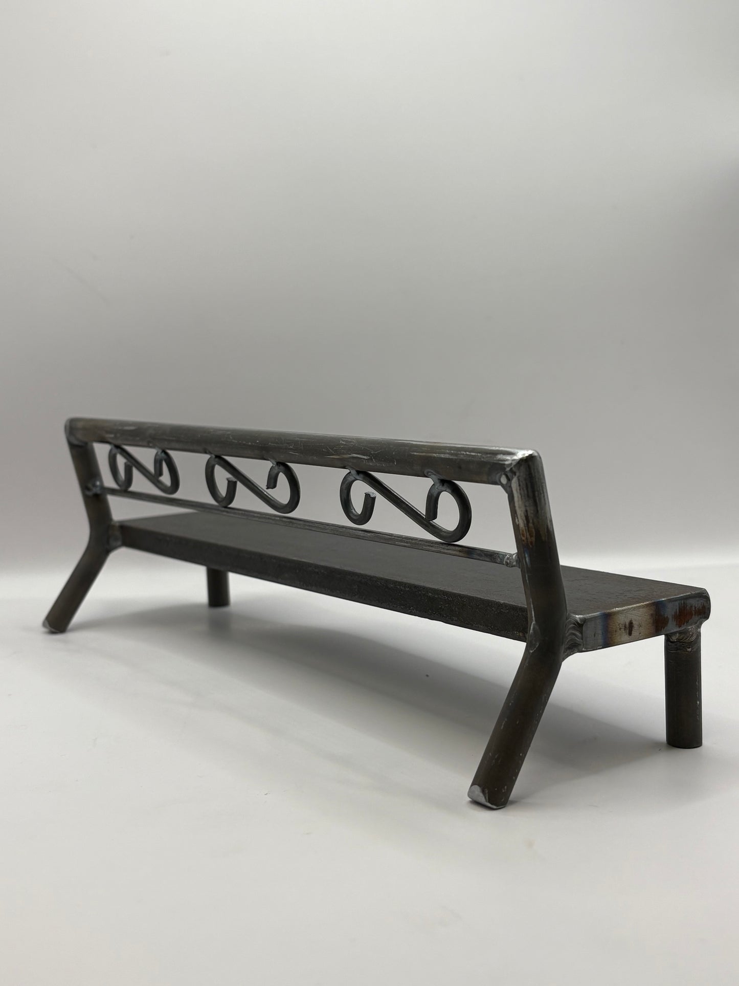 Unique scroll bench 1 of 1