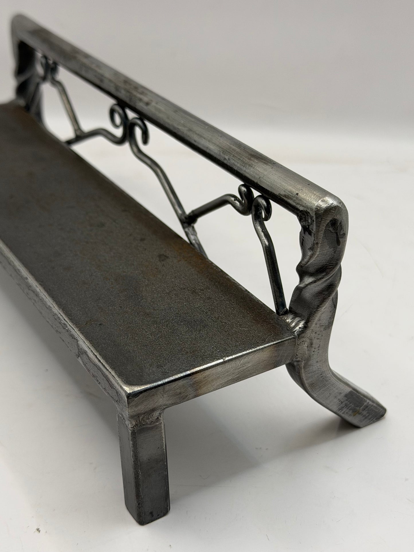 Twisted scrolled bench 1 of 1