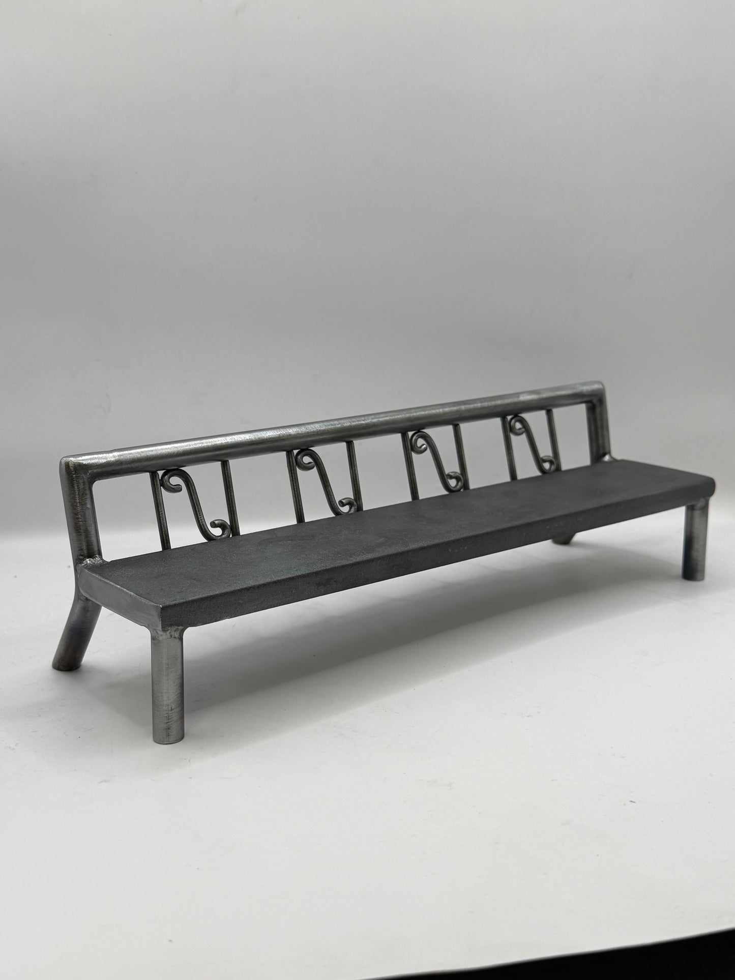 Scrolled fence bench 1 of 1