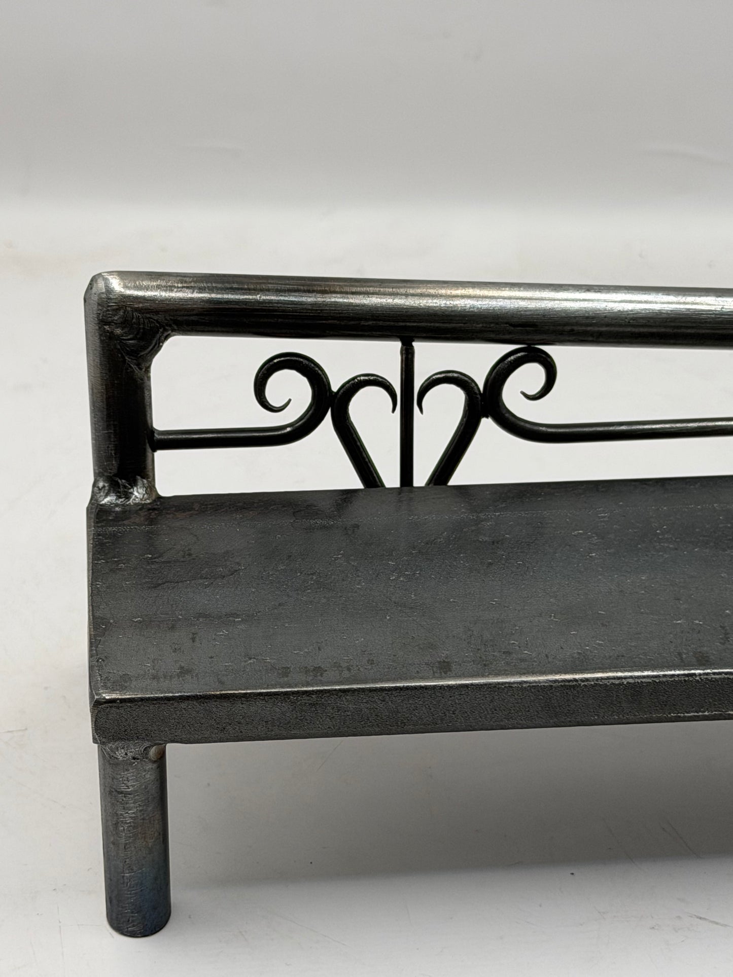 Left top rail scrolled heart bench 1 of 1
