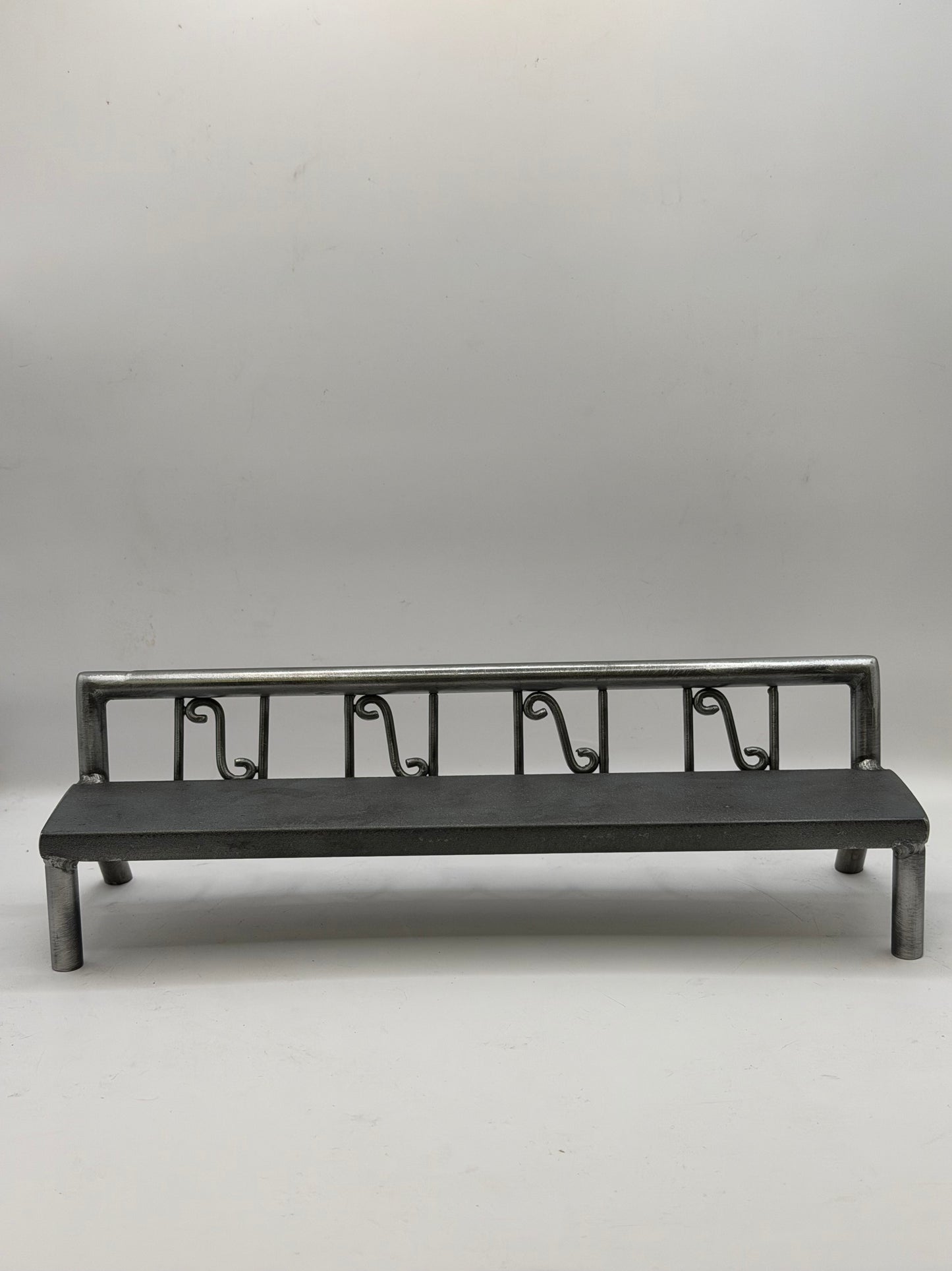 Scrolled fence bench 1 of 1
