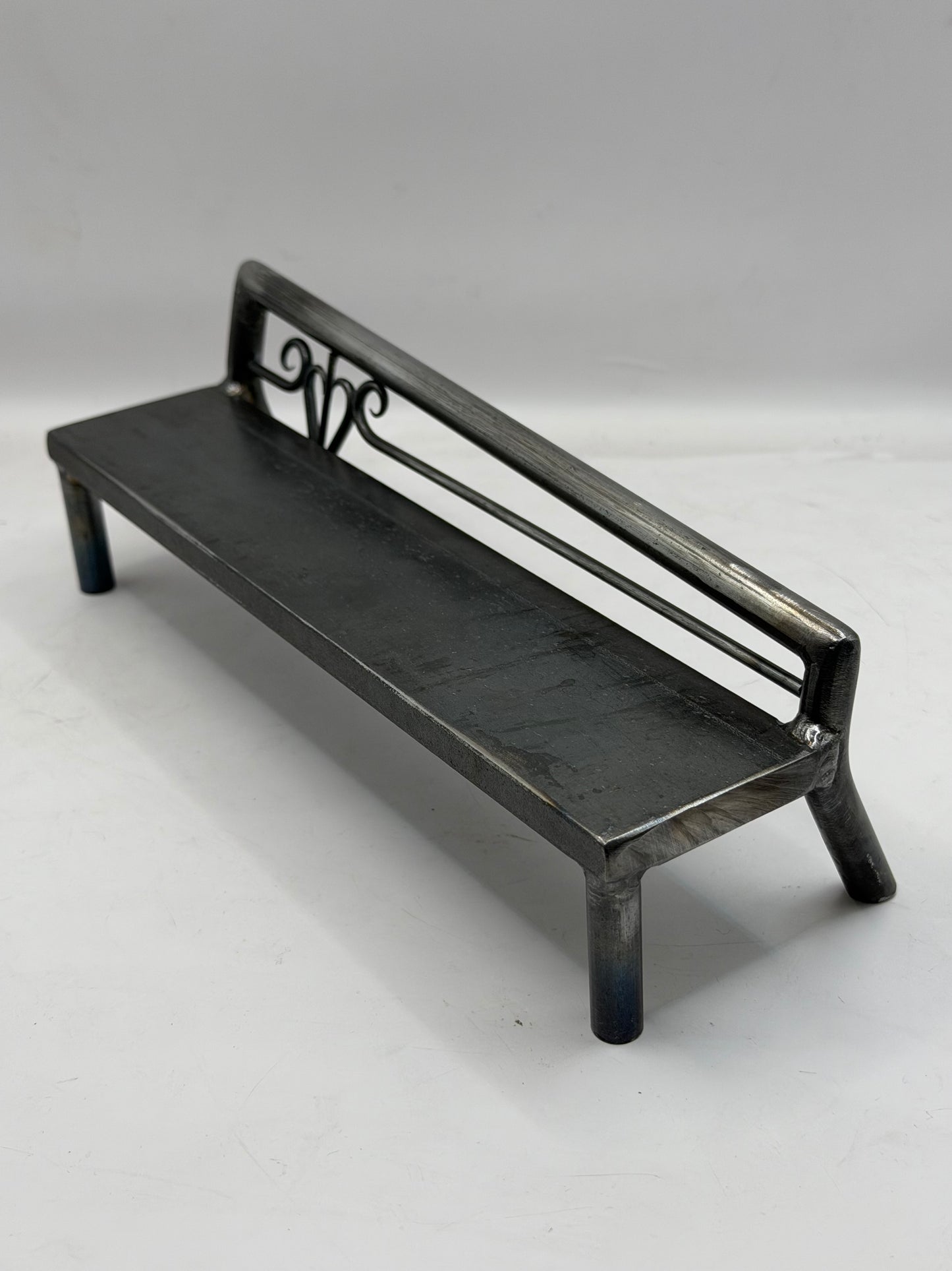 Left top rail scrolled heart bench 1 of 1