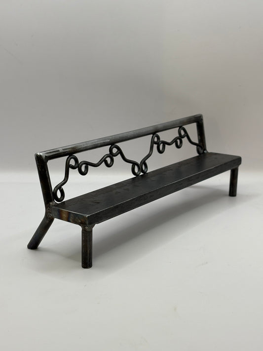Scrolled pattern bench 1 of 1
